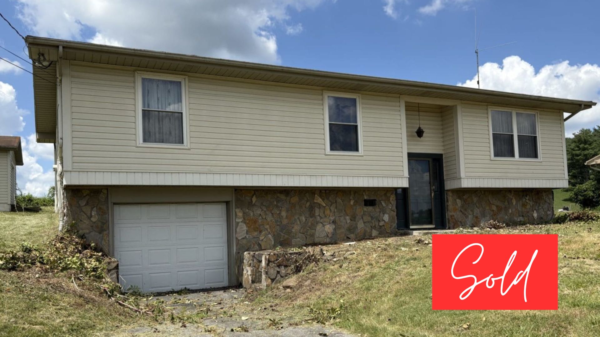 This image is by Powell Auction & Realty.