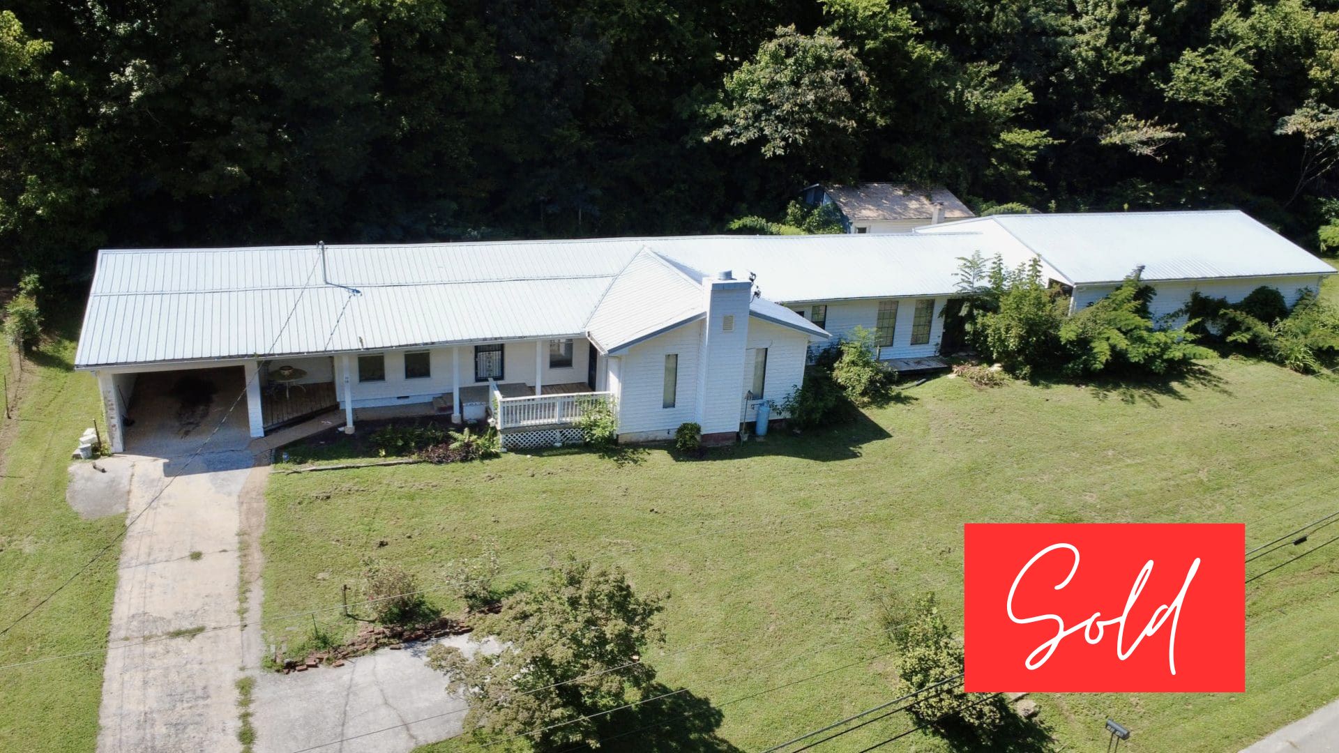 This image is by Powell Auction & Realty.