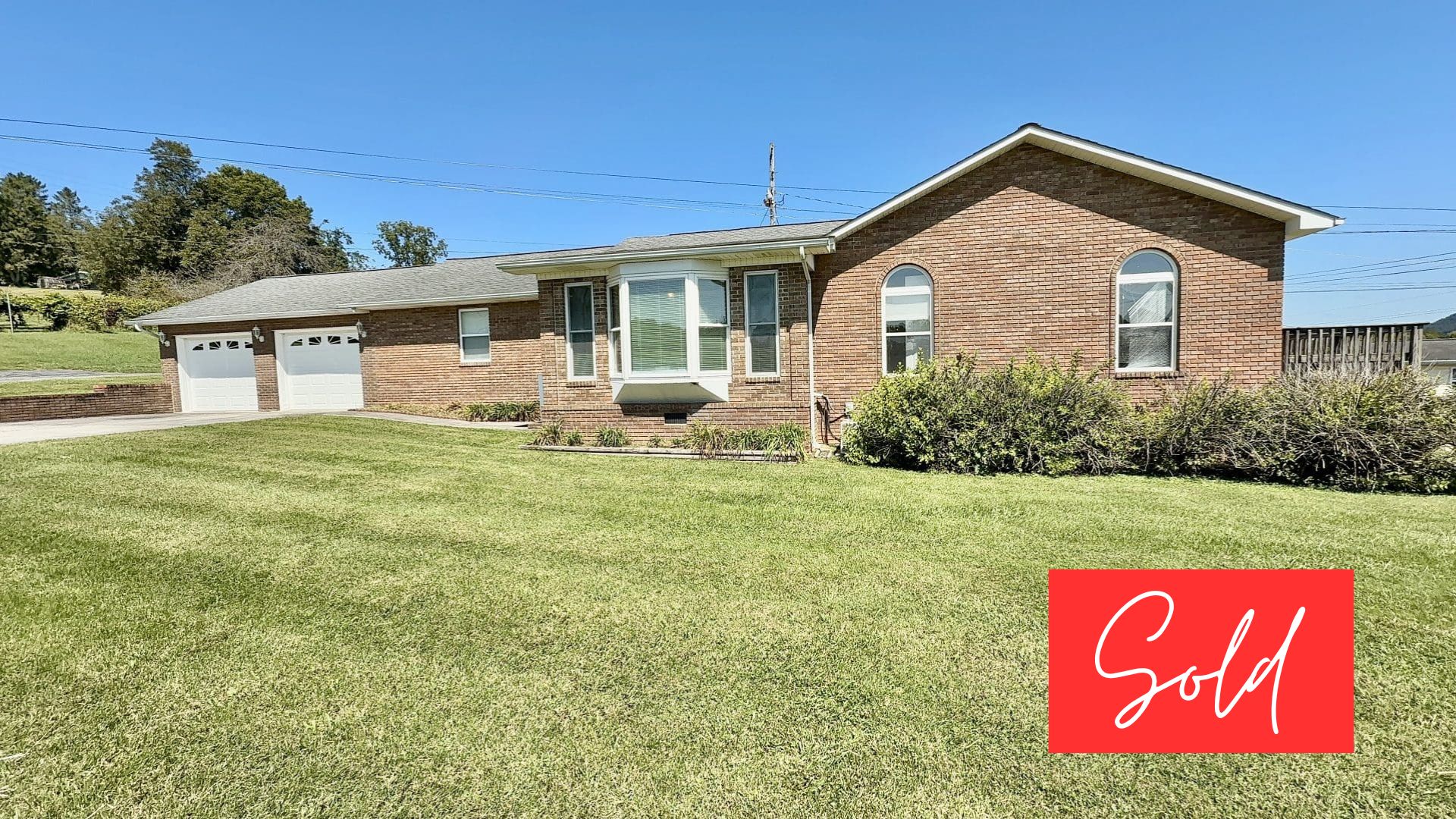 This image is by Powell Auction & Realty.