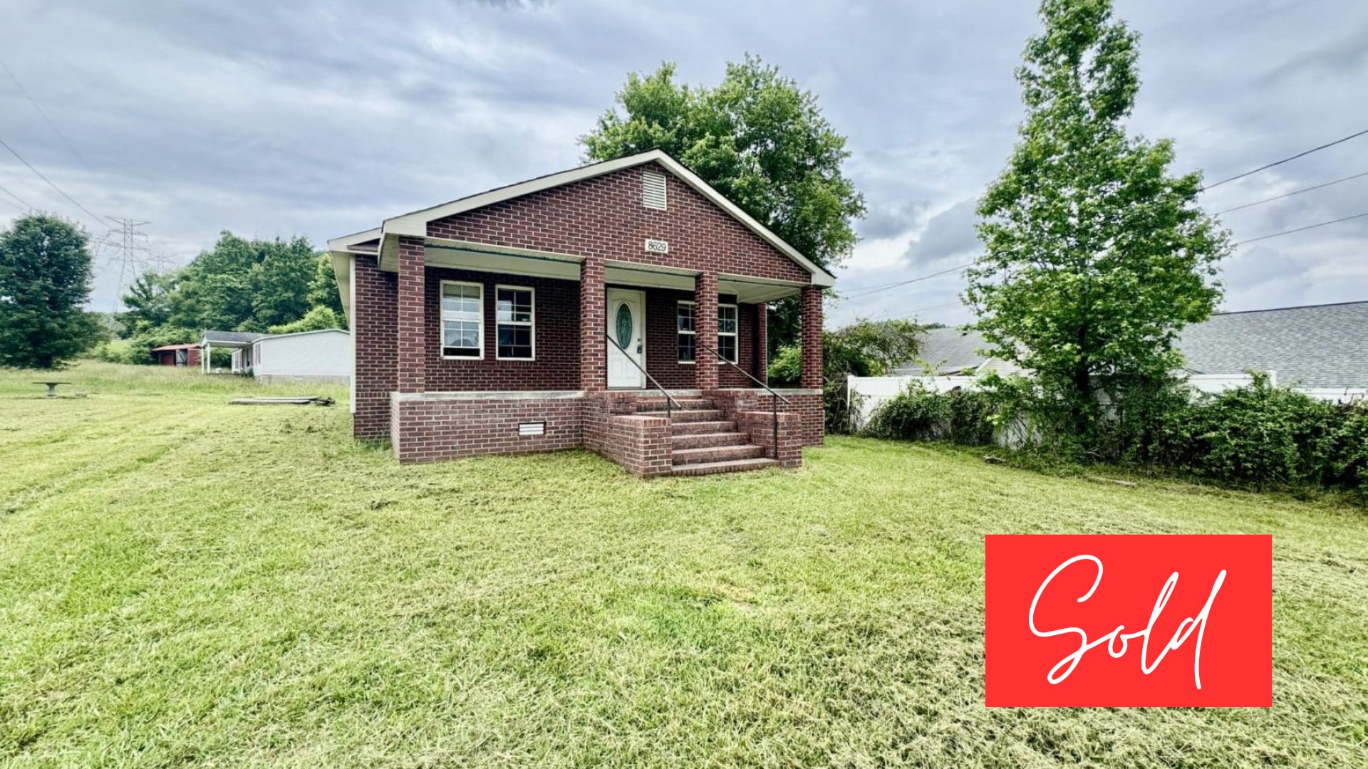 This image is by Powell Auction & Realty.