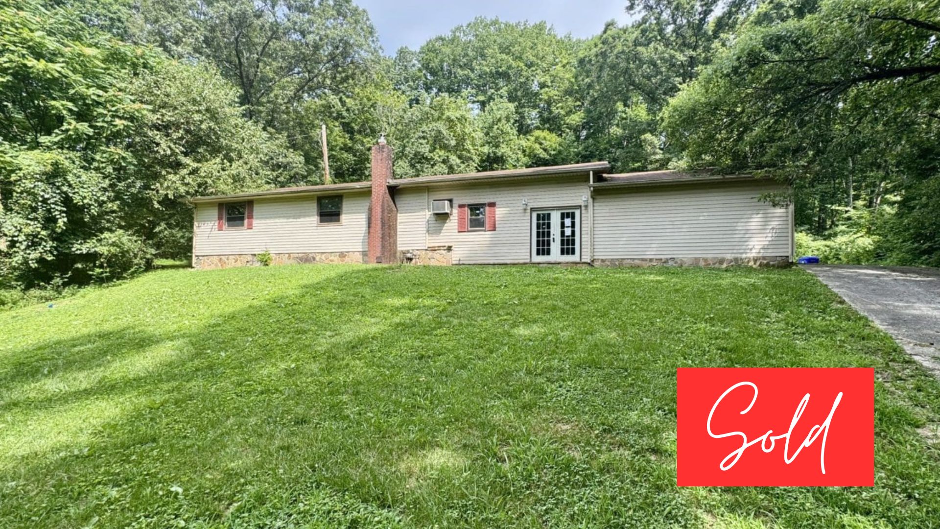 This image is by Powell Auction & Realty.