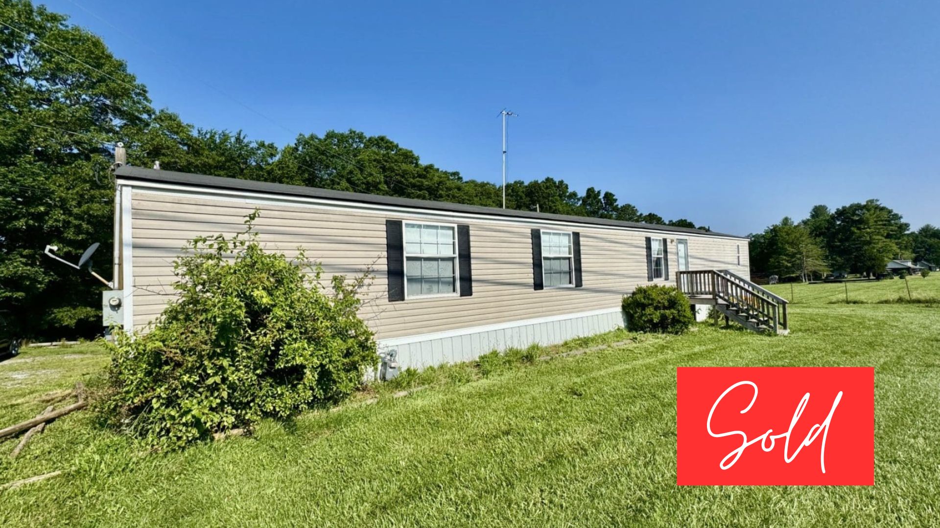 This image is by Powell Auction & Realty.