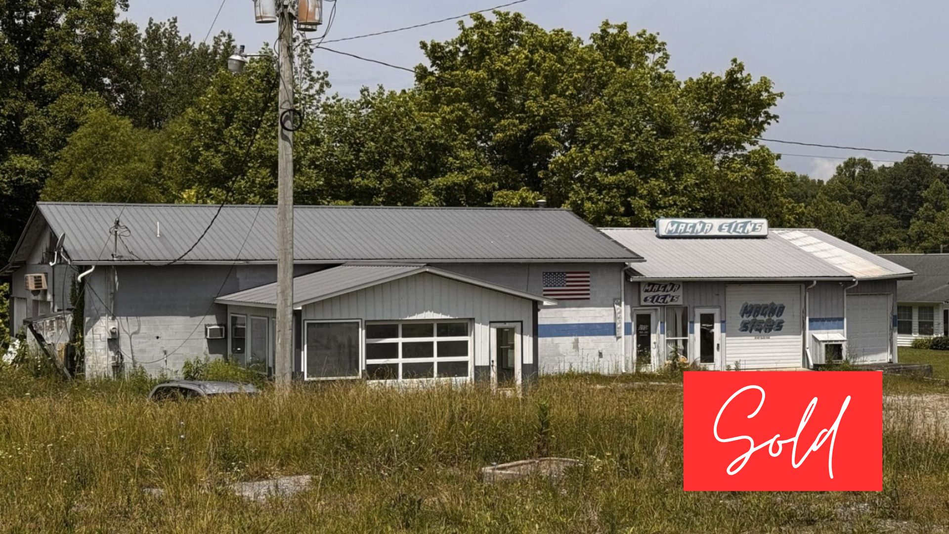 This image is by Powell Auction & Realty.